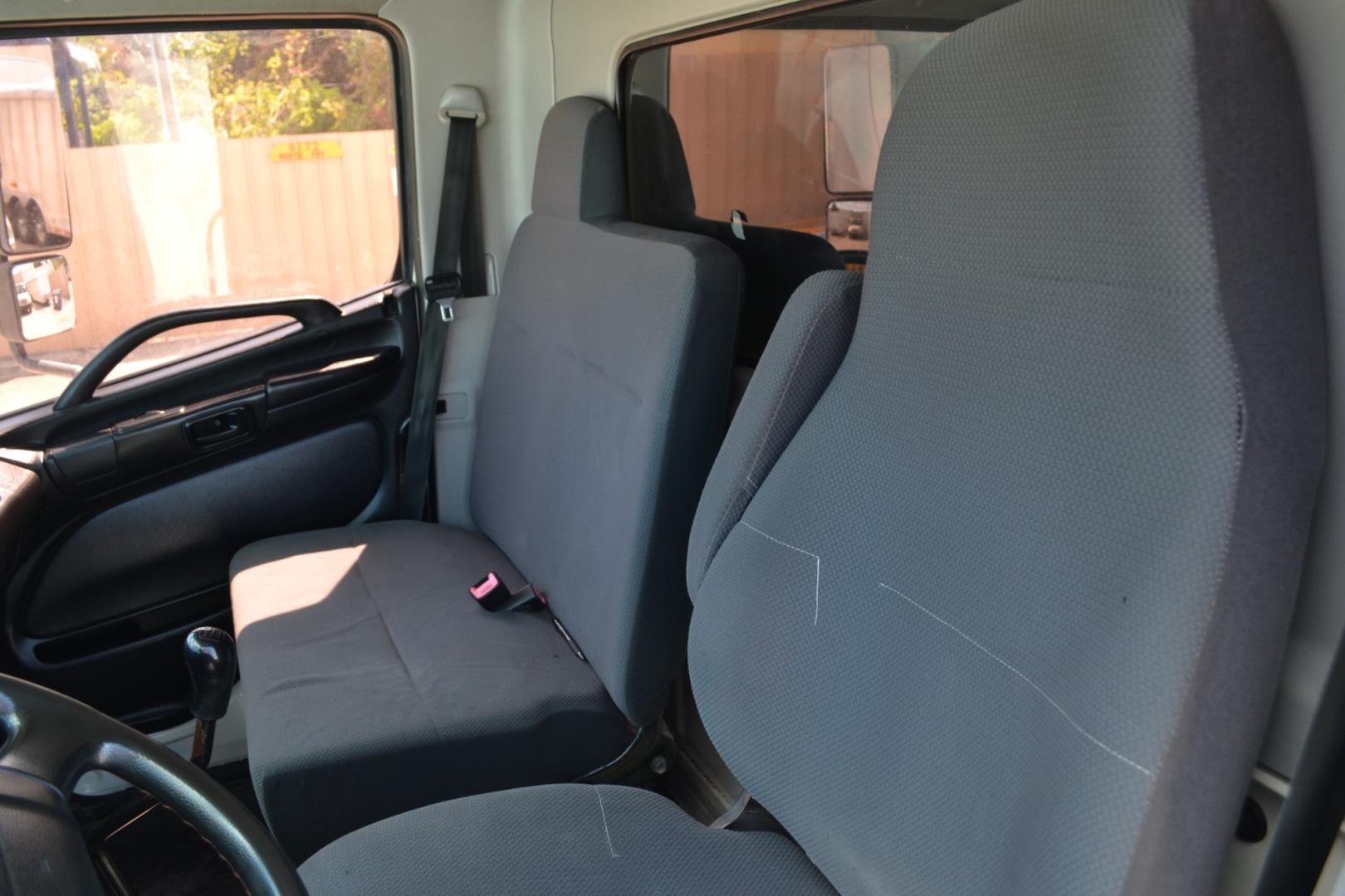2012 WHITE HINO 338 with an HINO J08E-VB 8L 260HP engine, 6SPD MANUAL transmission, located at 9172 North Fwy, Houston, TX, 77037, (713) 910-6868, 29.887470, -95.411903 - 24FT FLATBED, 33,000LB GVWR ,98" WIDE , TOOL BOX, 90 GALLON FUEL TANK, SPRING RIDE, COLD A/C , CRUISE CONTROL, POWER WINDOWS & LOCKS - Photo#10